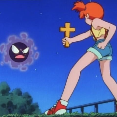 Misty holding crucifix reference